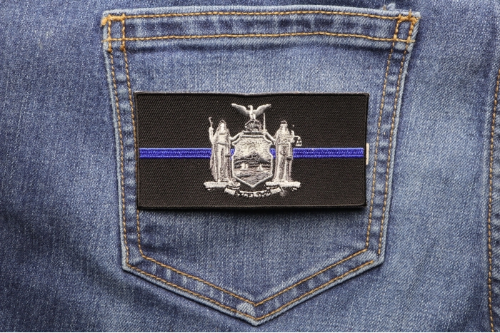 Thin Blue Line New York State Flag Patch For Law Enforcement shown on jeans