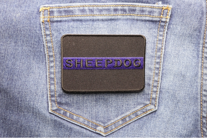 Thin Blue Line Sheepdog Patch For Law Enforcement shown on jeans