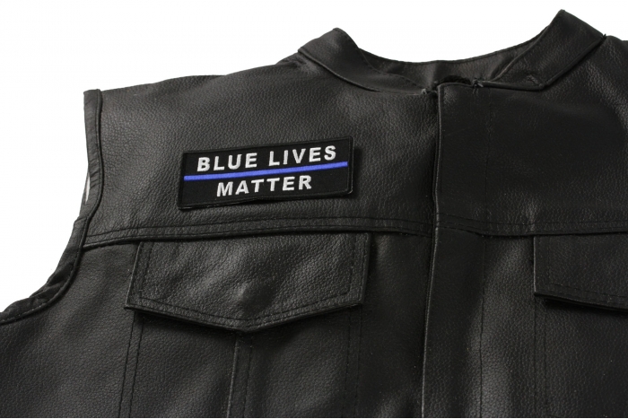 Blue Lives Matter Patch with Blue Line - 4x1.7 inch. Embroidered Iron on Patch shown on leather vest
