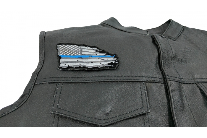Thin Blue Line American Tattered Flag Patch - 4x3 inch. Embroidered Iron on Patch shown on leather vest