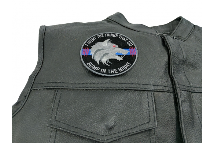 Thin Blue Line Bump In The Night Wolf Patch - 3.5x3.5 inch. Embroidered Iron on Patch shown on leather vest