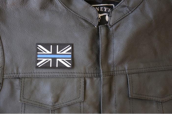 UK Flag Patch with Blue Line for Police - 3x2 inch - Embroidered Iron on Patch shown on leather vest