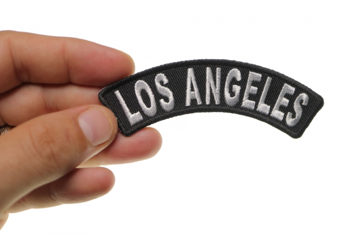 Los Angeles Patch shown on hand for size comparison
