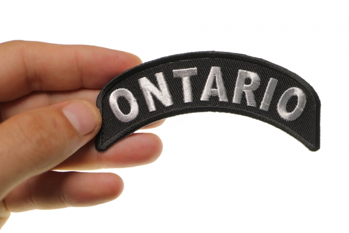 Ontario City Patch shown on hand for size comparison
