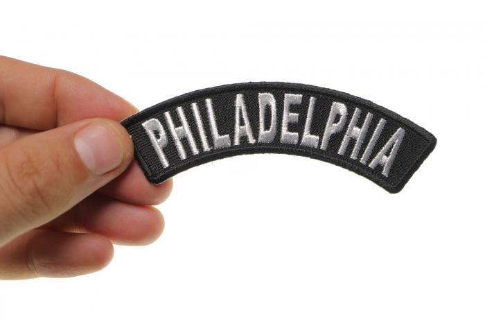 Philadelphia Patch shown on hand for size comparison