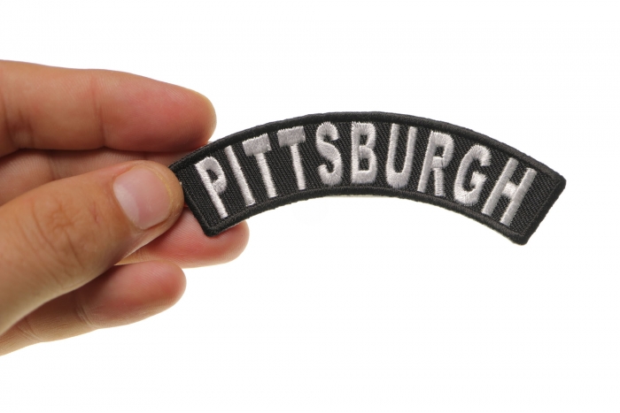 Pittsburgh Patch shown on hand for size comparison