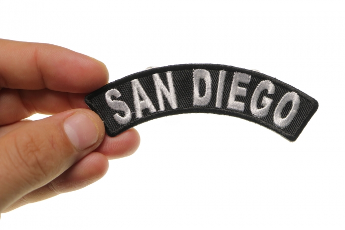 San Diego Patch shown on hand for size comparison