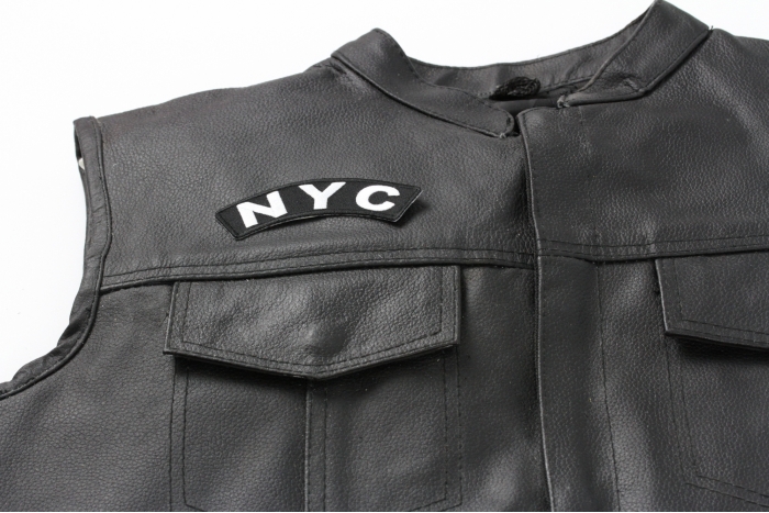 Nyc Patch - 4x1 inch. Embroidered Iron on Patch shown on leather vest