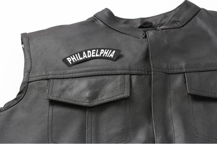 Philadelphia Patch - 4x1 inch. Embroidered Iron on Patch shown on leather vest