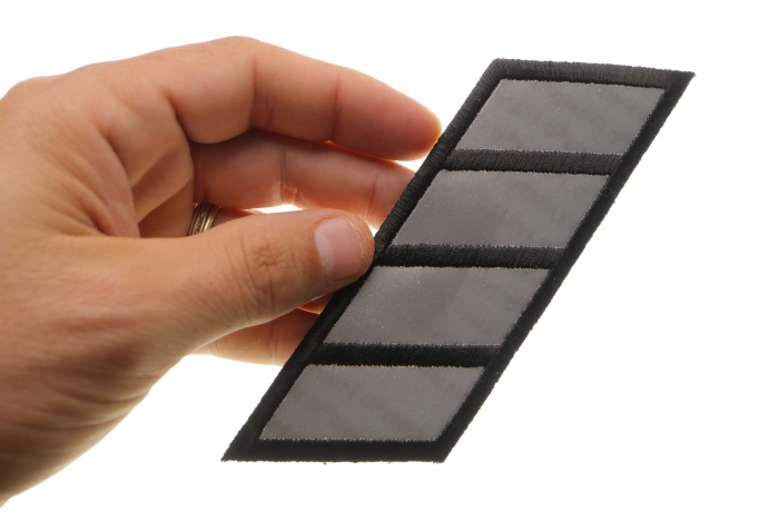 Reflective Stripes 6 inch Patch shown on hand for size comparison