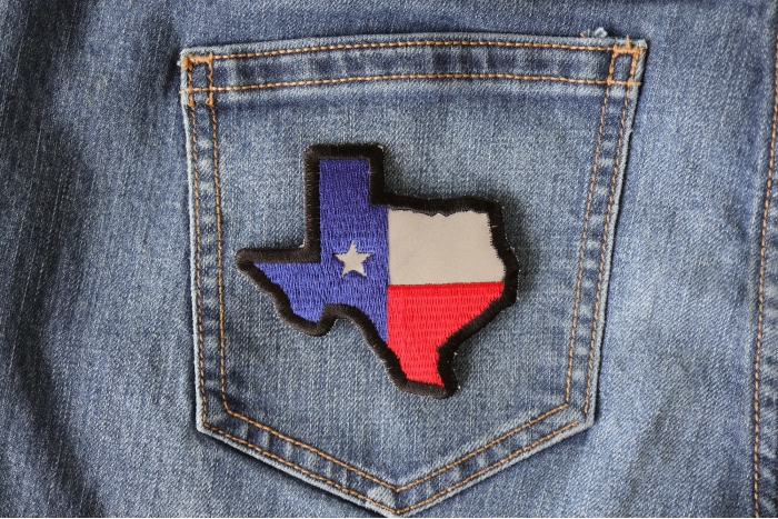Reflective Texas Map Flag Patch shown on jeans