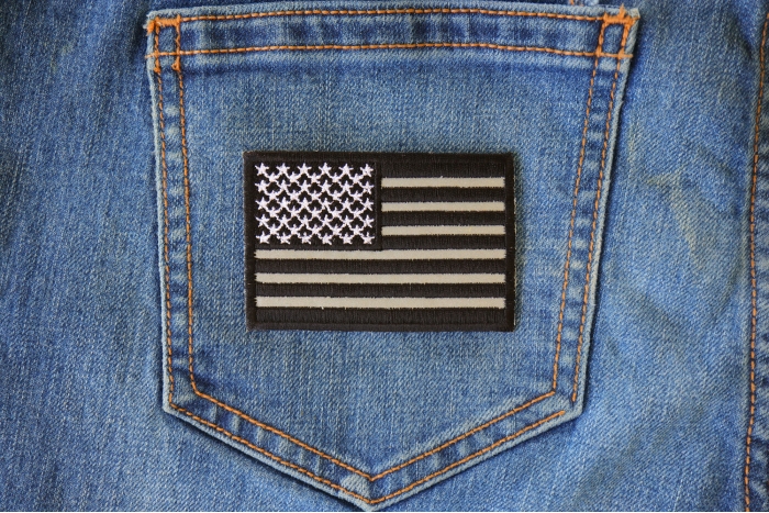 Black White and Reflective US Flag Patch shown on jeans
