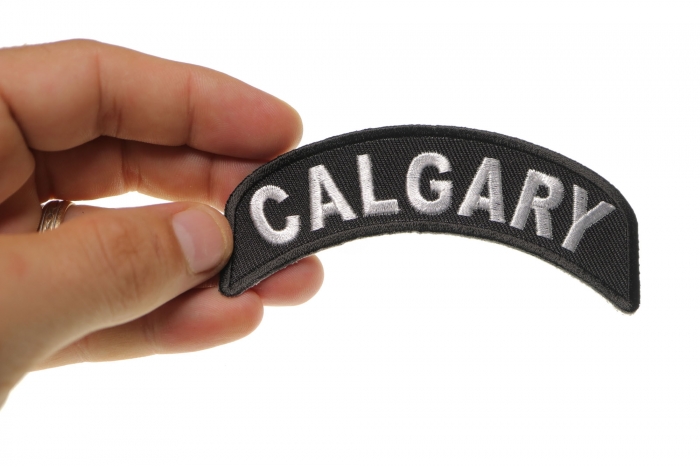 Calgary City Patch shown on hand for size comparison