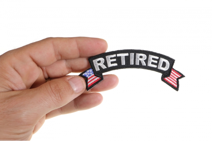 Retired Small Rocker Patch With American Flag Tips shown on hand for size comparison