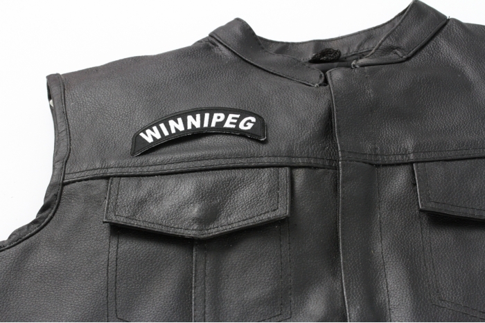 Winnipeg City Patch - Iron on Patch - 4x1.75 inch shown on leather vest