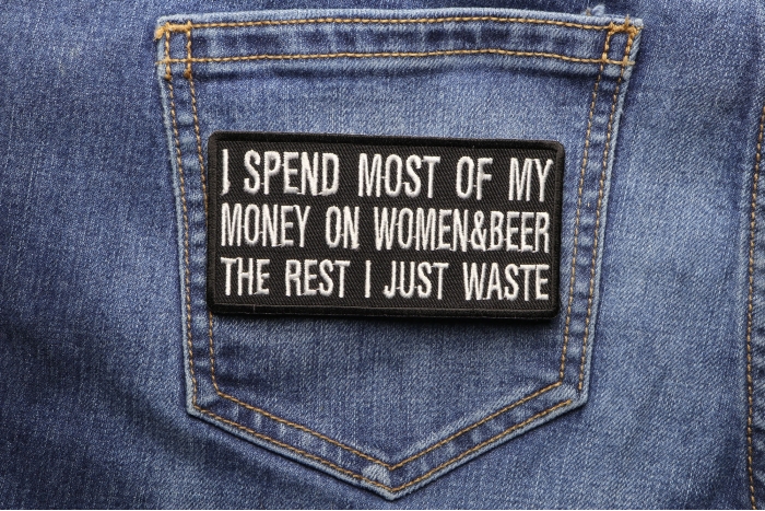 I Spend Most Of My Money On Women and Beer The Rest I Just Waste Patch shown on jeans
