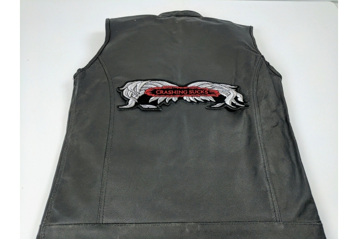  shown on leather vest