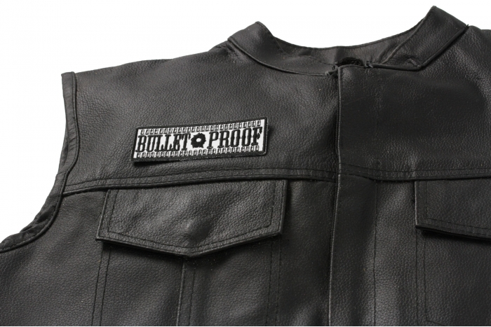 Bullet Proof Patch - 4x1.5 inch Embroidered Iron on Patch shown on leather vest