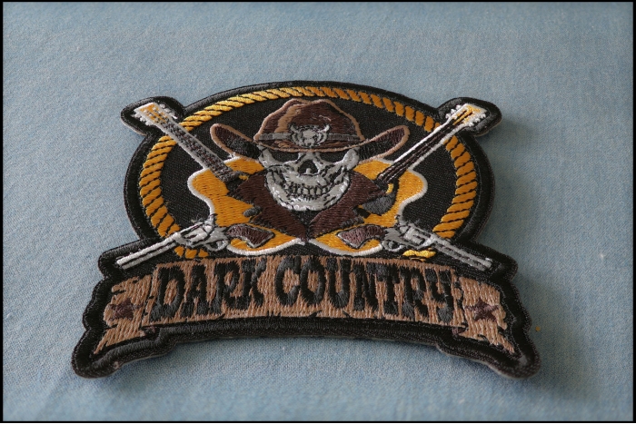 Dark Country Music Patch with Skull Cowboy Hat Guitars Pistols  diagonal view