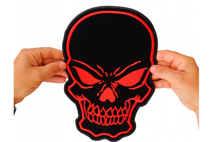 Skull Patch, Large Skull Patches for Biker Jackets shown on hand for size comparison