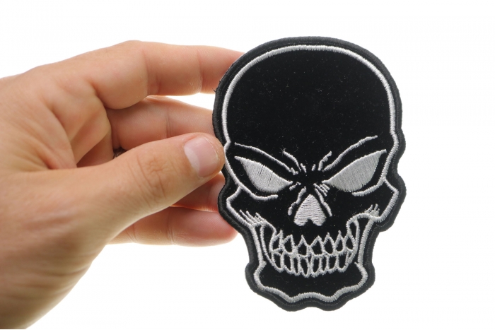 Black Skull Patch, Biker Skull Patches shown on hand for size comparison