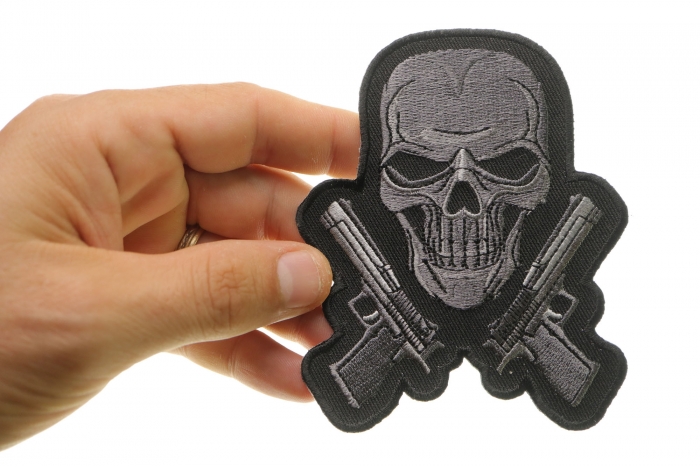 Guns and Skull Patch, Skull Patches shown on hand for size comparison