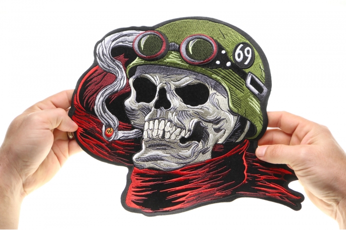 69 Skull Cigar Patch, Large Skull Patches for Biker Jackets shown on hand for size comparison