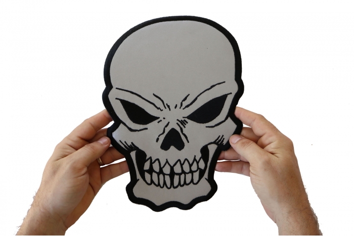 Skull Patch, Large Skull Patches for Biker Jackets shown on hand for size comparison