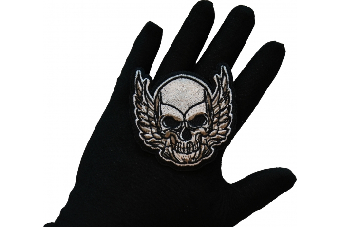 Rising Wing Skull Patch, Biker Skull Patches shown on hand for size comparison