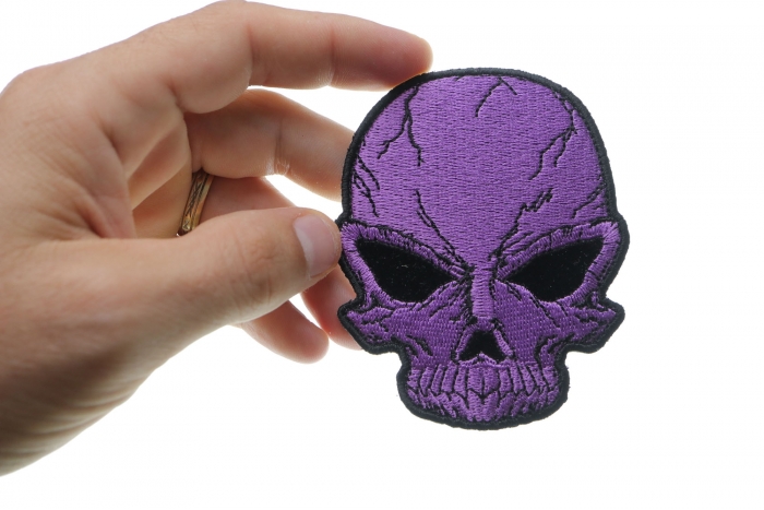  shown on hand for size comparison