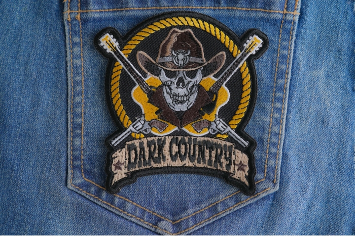 Dark Country Music Patch with Skull Cowboy Hat Guitars Pistols  shown on jeans
