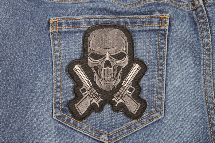 Guns and Skull Patch shown on jeans