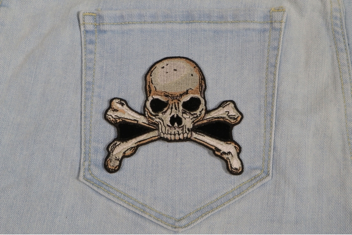 Skull and Cross Bones Patch Small shown on jeans