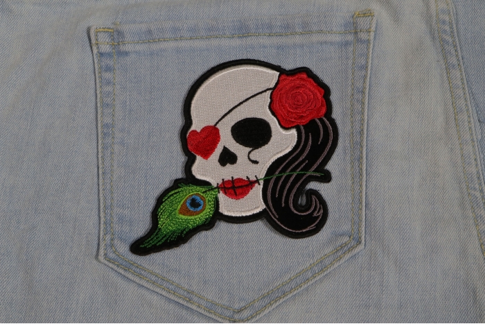 Heart Eye Lady Skull Patch shown on jeans