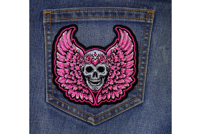 Pink Angel Wings Skull Patch shown on jeans