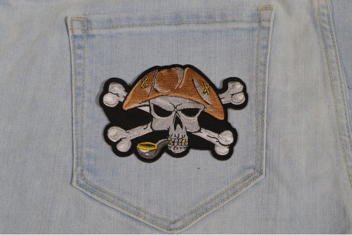 Pipe Smoking Skull with Hat Iron on Patch shown on jeans