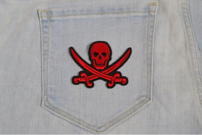 Red Pirate Sword Skull Patch shown on jeans