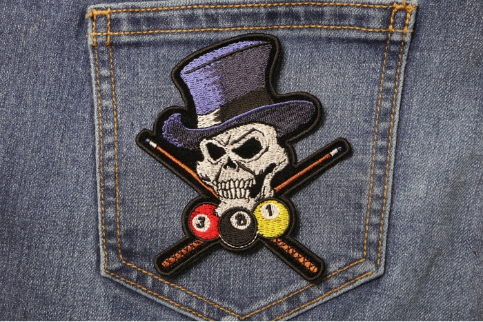 Skull and Pool Sticks Patch shown on jeans