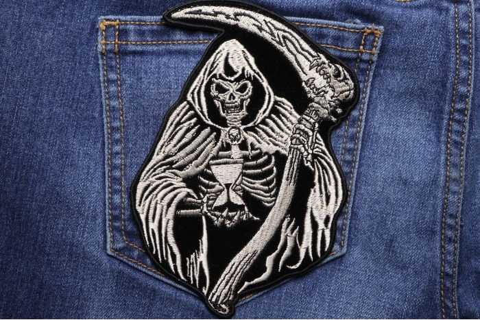 Sand Clock Reaper Skull Patch shown on jeans