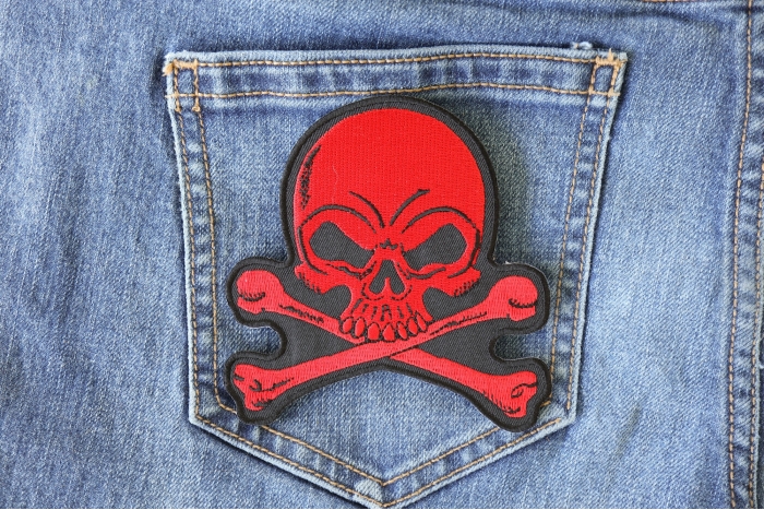 Red Skull and Cross Bones Biker Patch shown on jeans