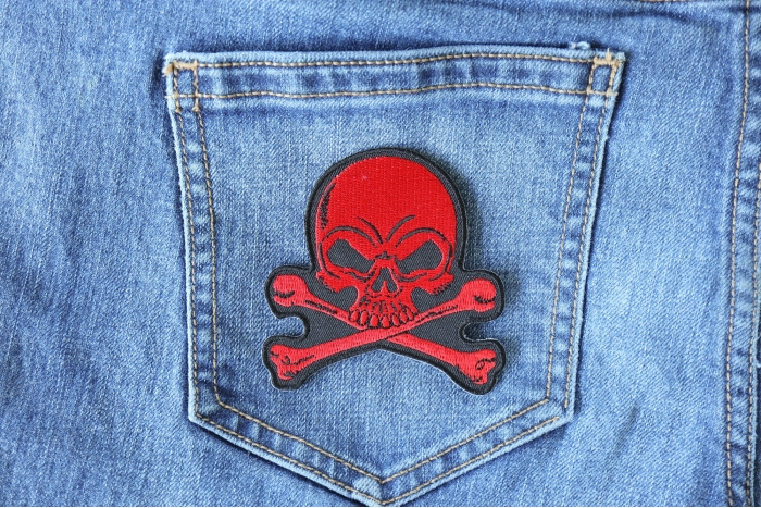 Red Skull and Crossbones Patch shown on jeans