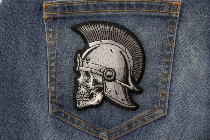 Roman Skull Patch shown on jeans