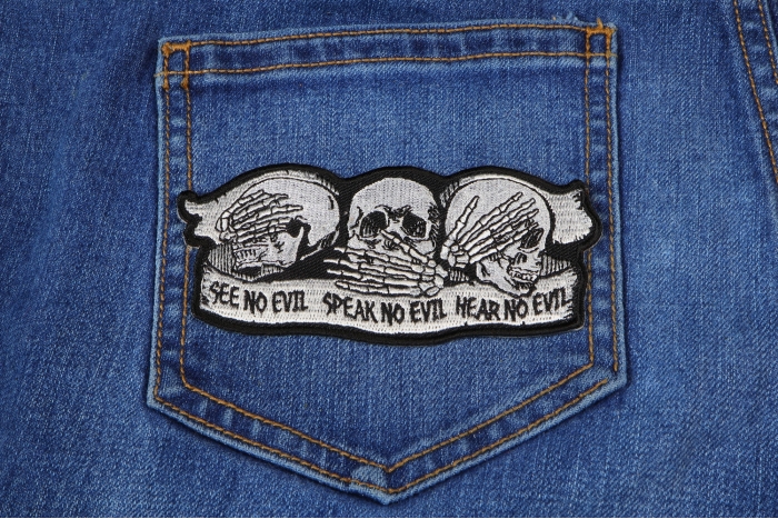See No Evil Speak No Evil Hear No Evil Skull Patch shown on jeans