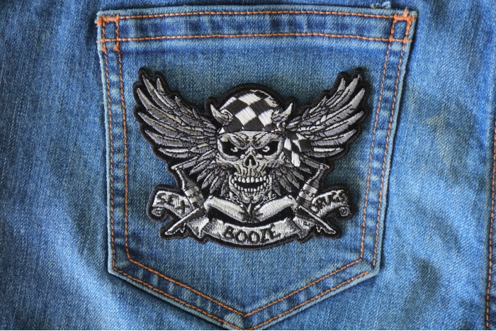 Winged Skull Sex Booze and Drugs Patch shown on jeans