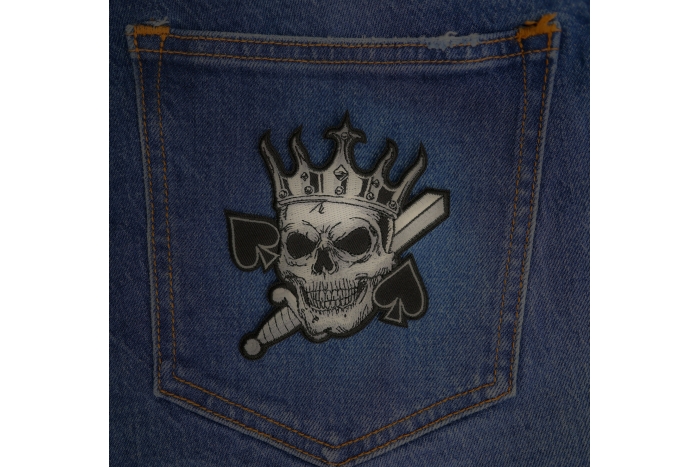 Spades Skull King Patch shown on jeans