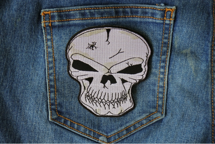 Gray Skull Patch shown on jeans