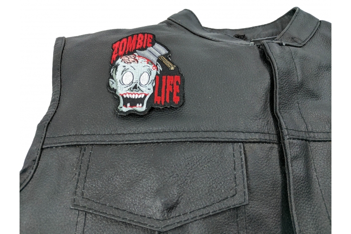 Zombie Life Small Patch With Axed Zombie - Iron on Patch - 4x3 inch shown on leather vest