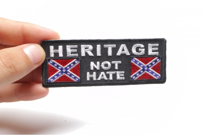 Heritage Not Hate Rebel Flag Patch shown on hand for size comparison
