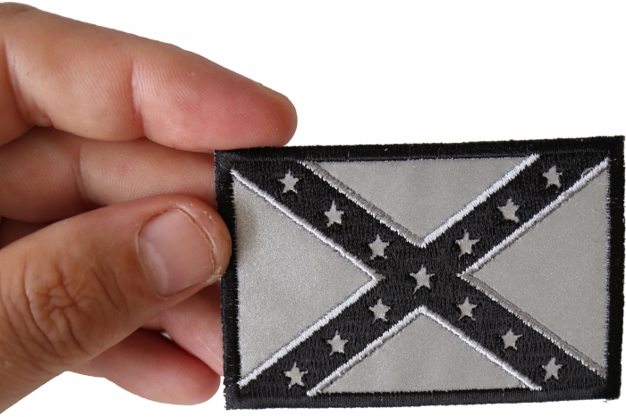 Reflective Rebel Flag Patch shown on hand for size comparison