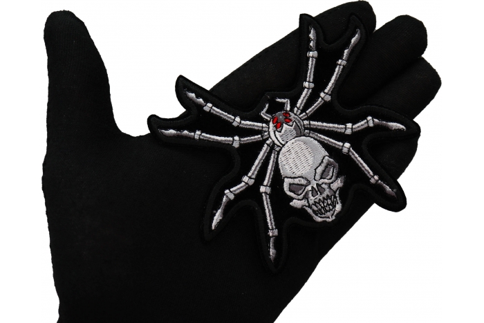 Skull Spider Patch shown on hand for size comparison